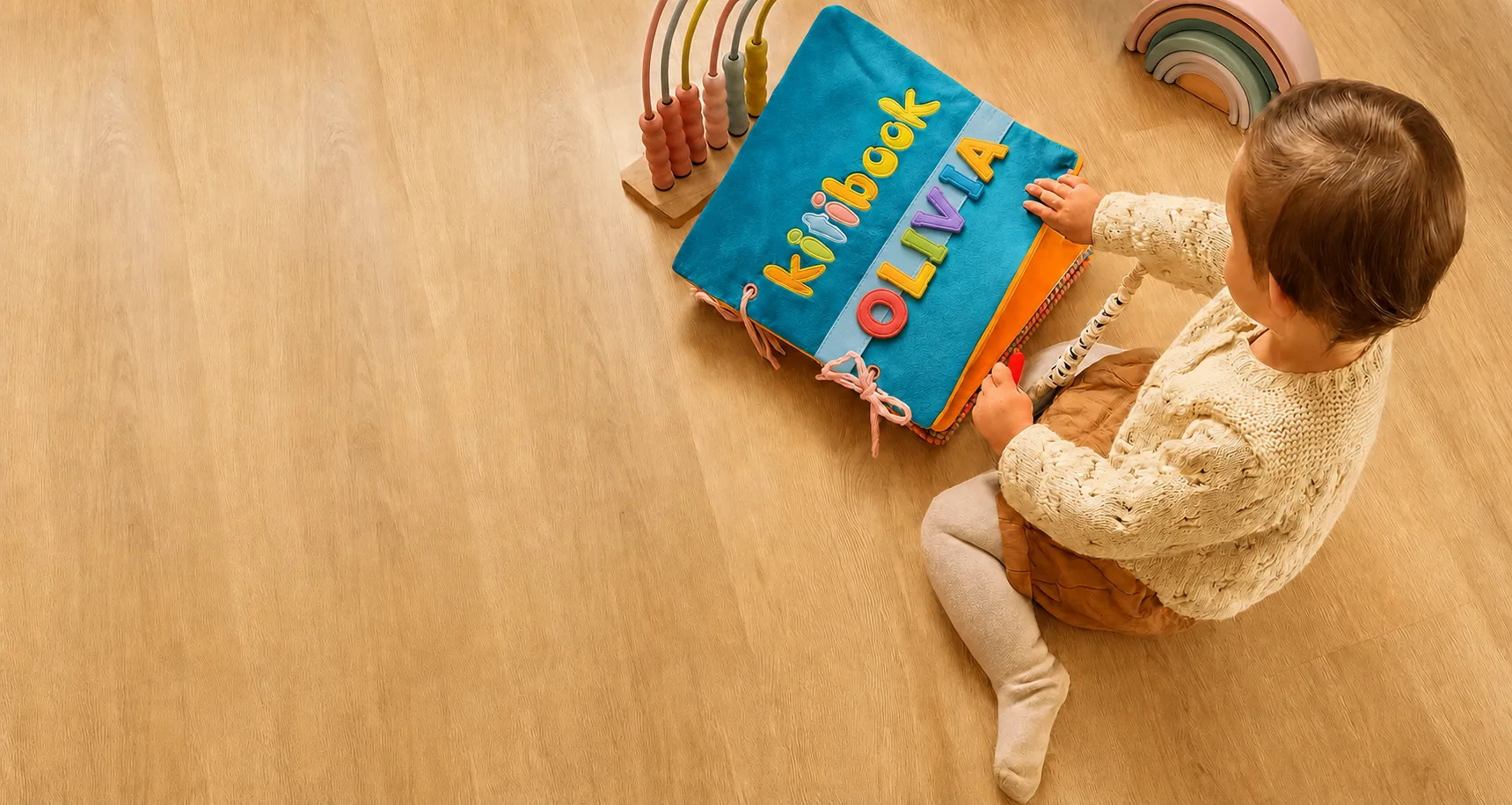 Child playing with their Kitibook — personalized Kitimimi activity book