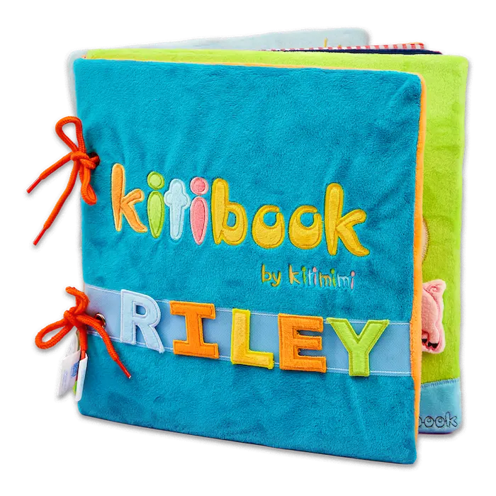 Kitibook ouvert — livre d'éveil sensoriel en tissu